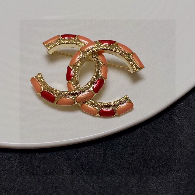 Ch*el brooches